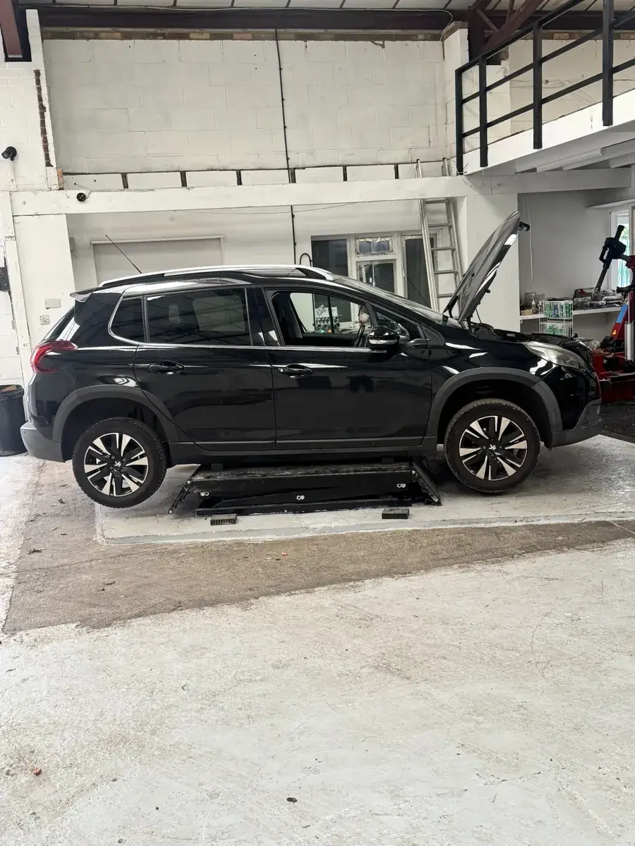 Peugeot 2008 1.2 PureTech wet belt replacement in the Enviro Repair workshop